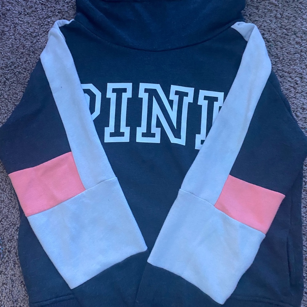 A pink brand hoodie/jacket